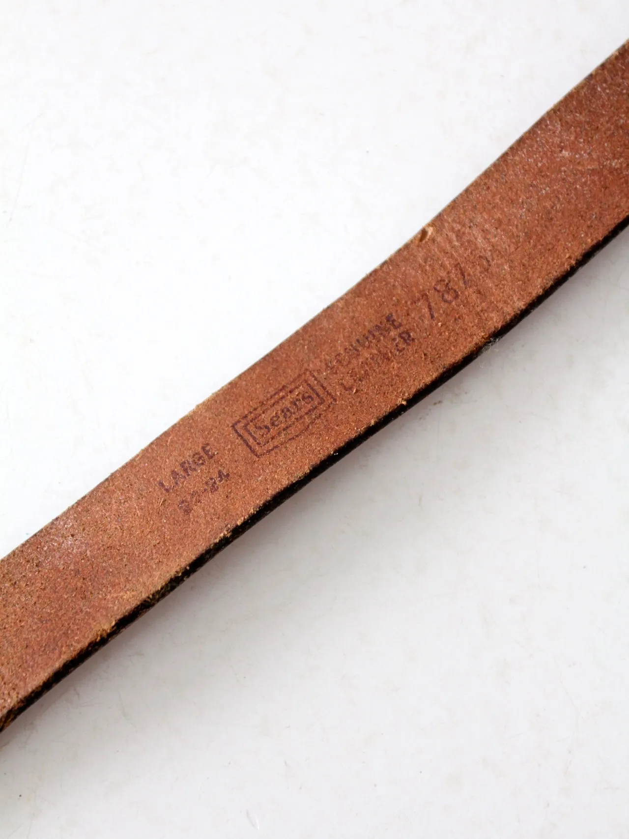 vintage kid's tooled leather belt